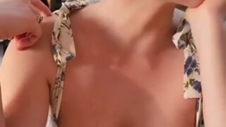 beautiful girl tease nipple in public