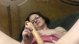 masturbation on bed with veiny dildo