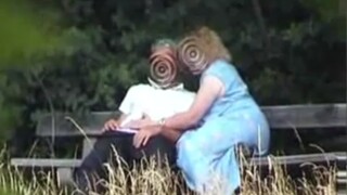 park bench mature couple spied on from bushes
